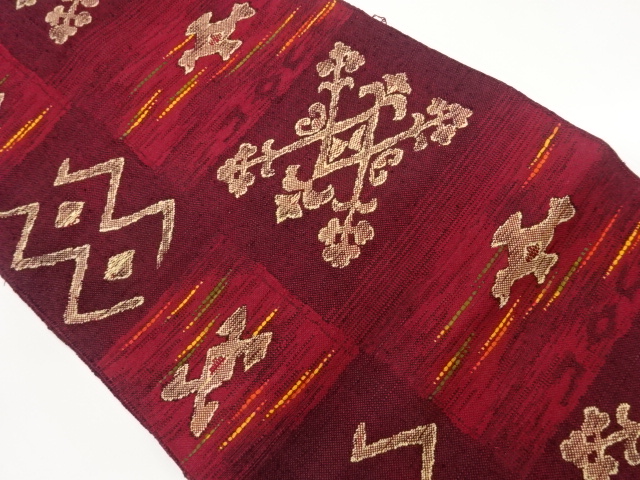 手織り真綿紬紐通しに抽象花唐草模様織出し名古屋帯